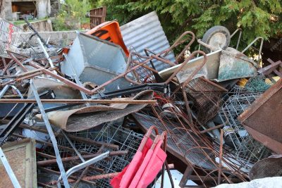many old rusty irons piled
