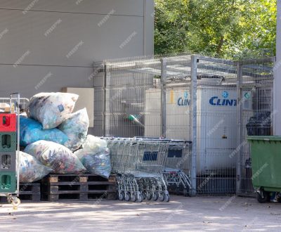 Retail Store Rubbish Removal with many waste containers garbage bags